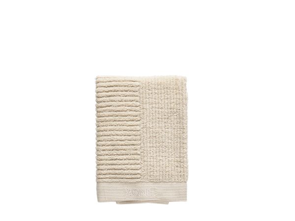 100% bavlnený a extra savý froté uterák CLASSIC o veľkosti 70x50 cm v príjemnej krémovej farbe.