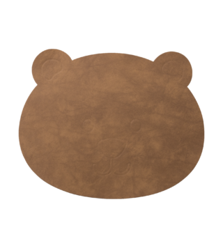 Kožené prestieranie pre deti v tvare hlavy medveďa v prírodnej hnedej farbe a rozmere 38 x 30 cm.